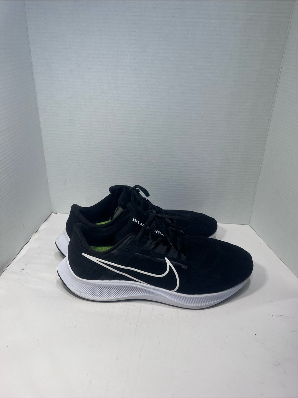 Nike Men’s Black Athletic Sneakers with White Swoosh